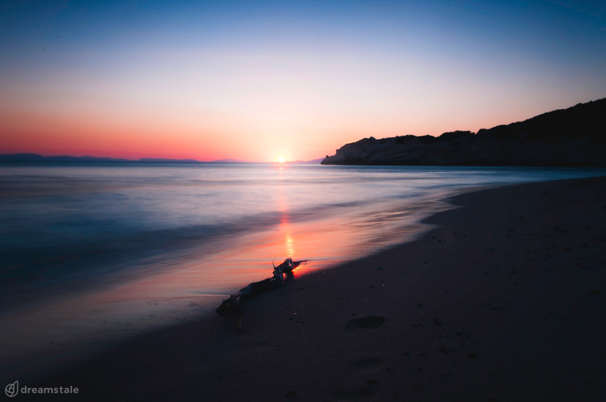Dramatic Landscape Beach Sunset Stock Photo